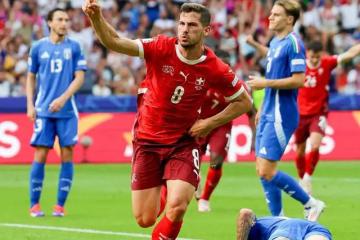 IM体育官网-瑞士队在比赛中表现出勇气与拼搏精神